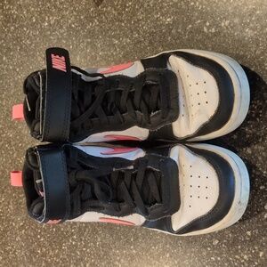 Girls Nike High top sneakers.  These still have a lot of life left in them.